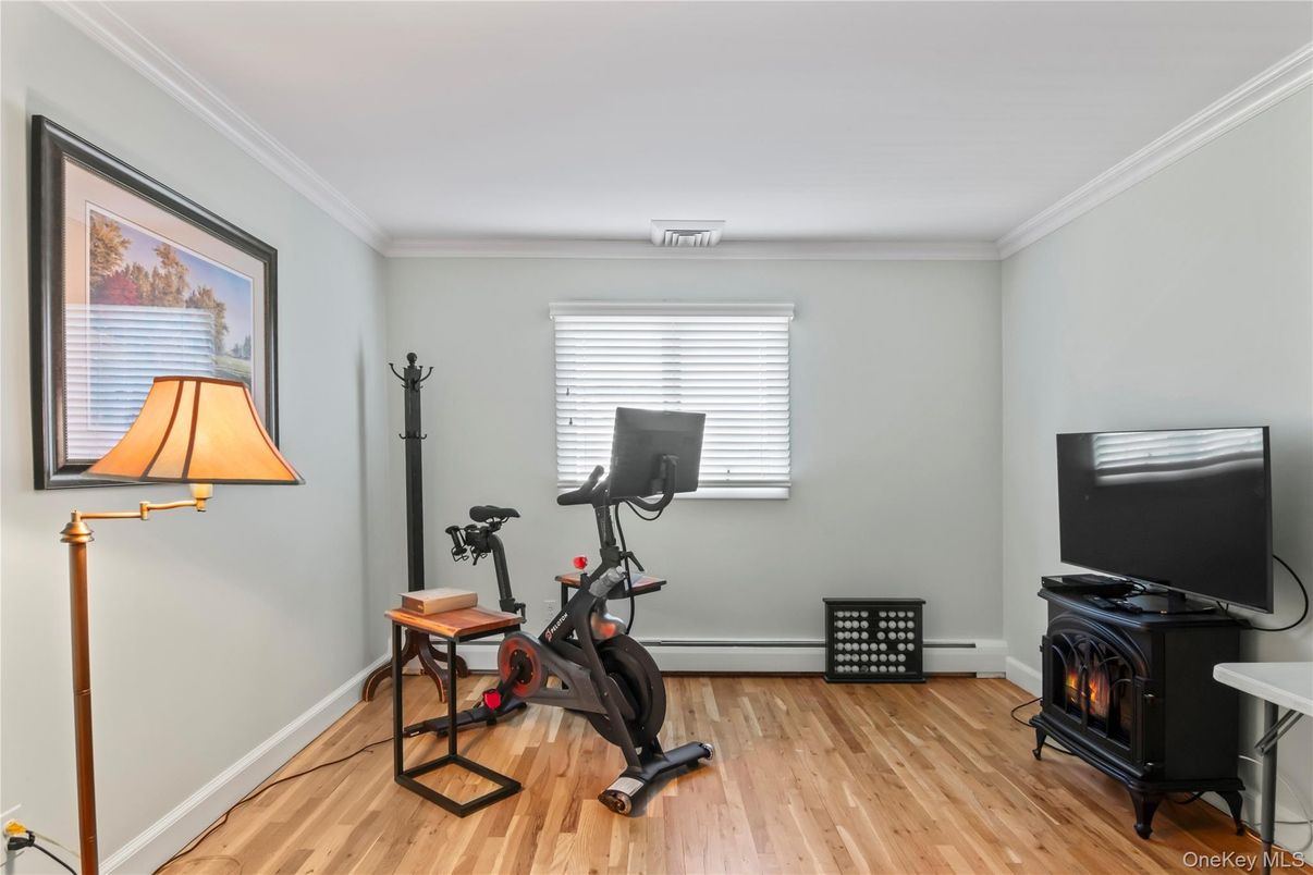 Fireplace, Fitness Equipment, Interior, Wood Texture Flooring