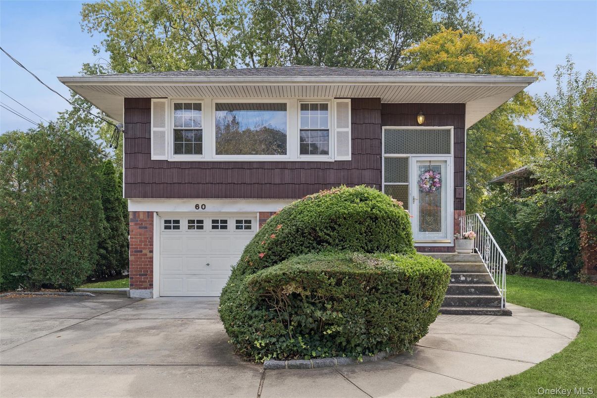 Attached, Exterior, Facade, Raised Ranch