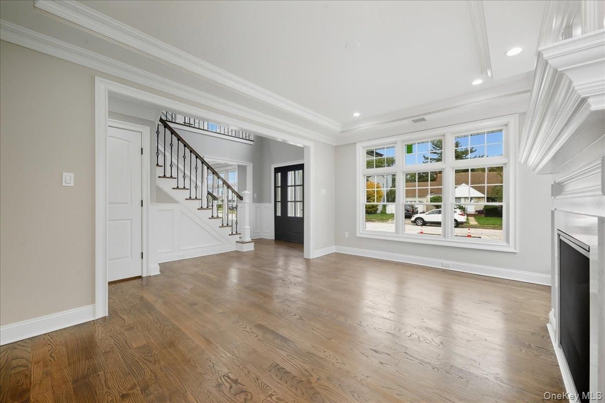 Empty room, Fireplace, Interior, Recessed Lighting, Wood Texture Flooring