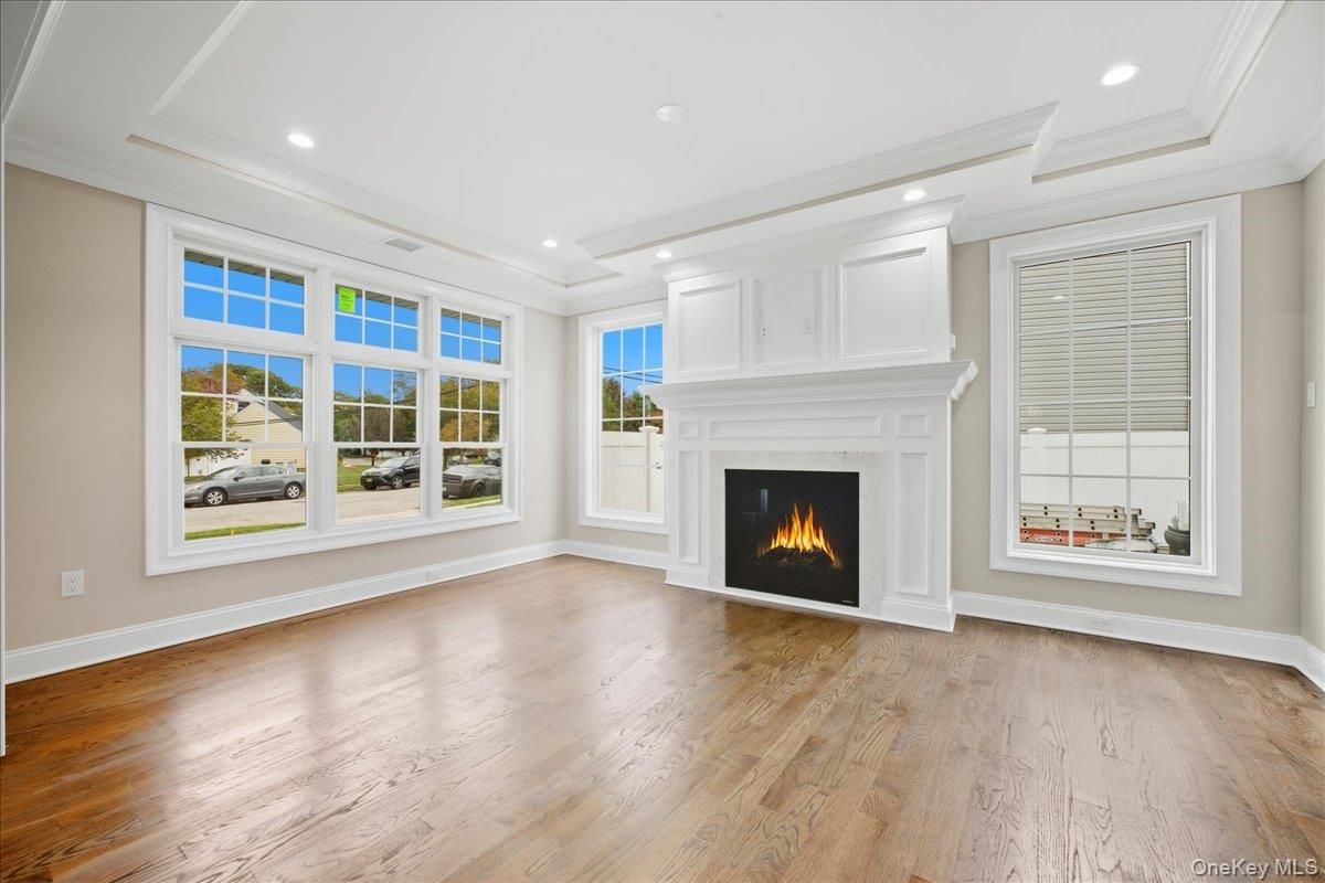 Empty room, Fireplace, Interior, Recessed Lighting, Wood Texture Flooring