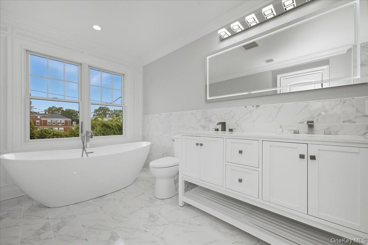 Bathroom, Dual Sink Vanities, Free Standing Baths, Interior, Marble, Marble Walls, Recessed Lighting