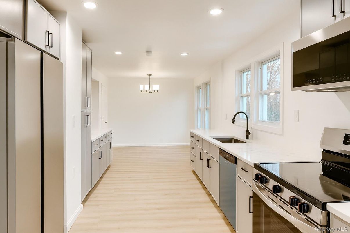Chandelier, Interior, Kitchen, Recessed Lighting, Stainless Steel Appliances, Wood Texture Flooring
