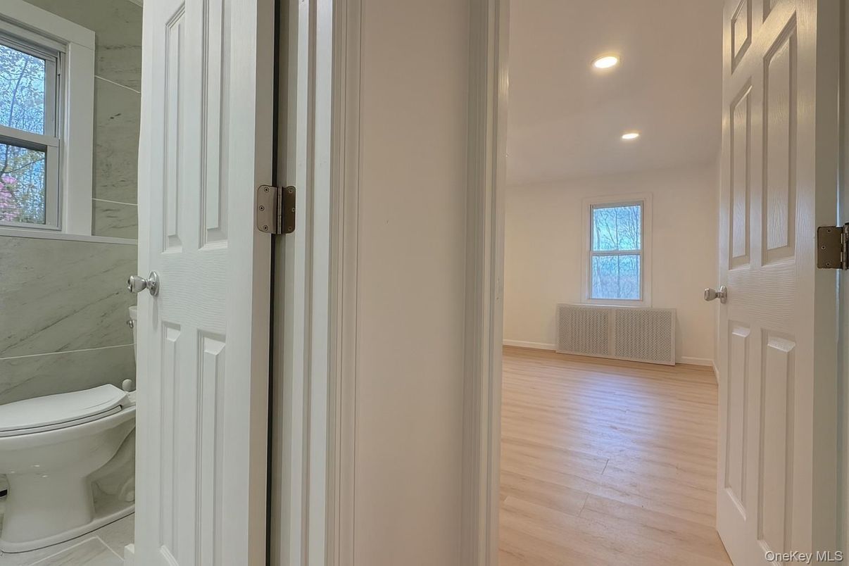 Bathroom, Interior, Marble Walls, Recessed Lighting, Wood Texture Flooring