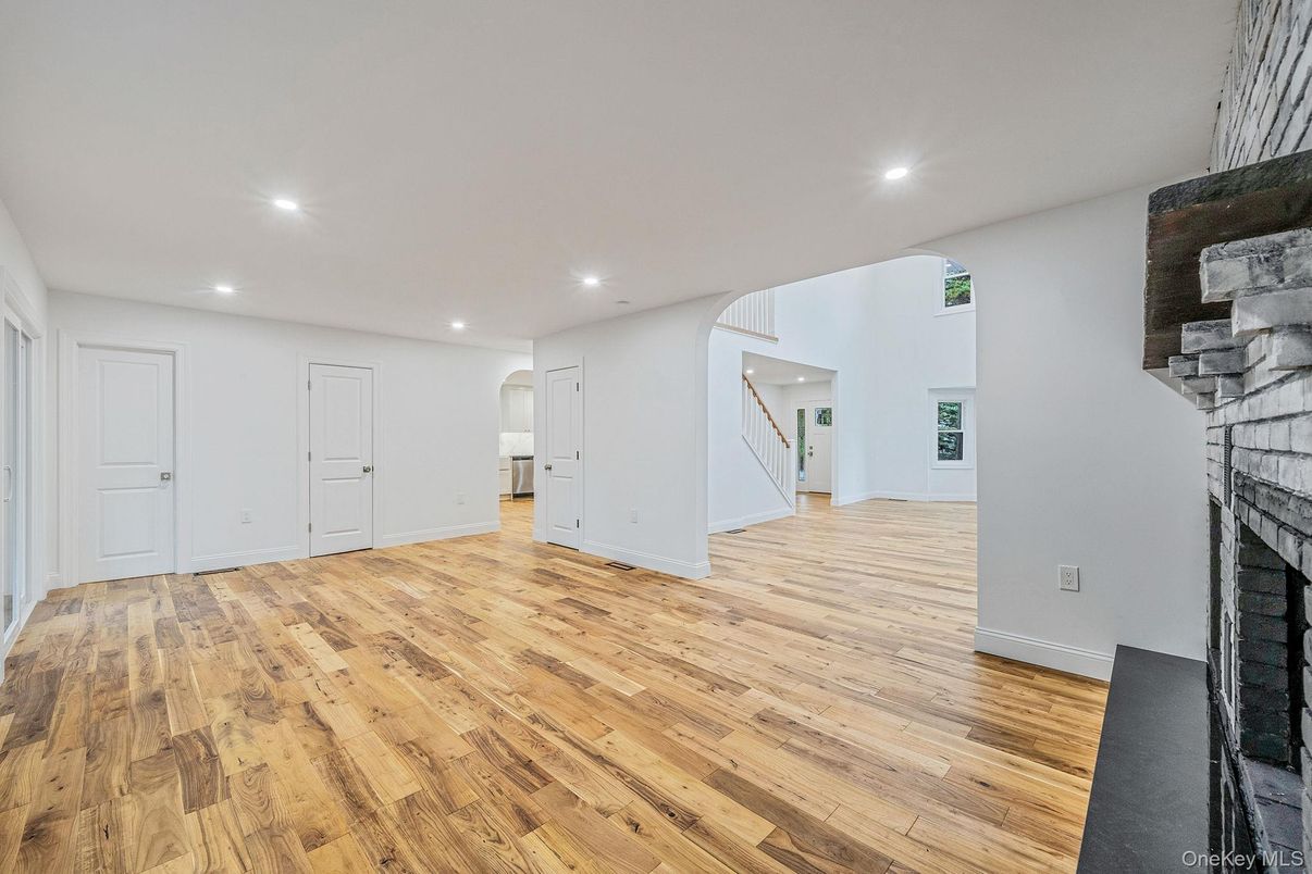 Empty room, Fireplace, Interior, Recessed Lighting, Wood Texture Flooring