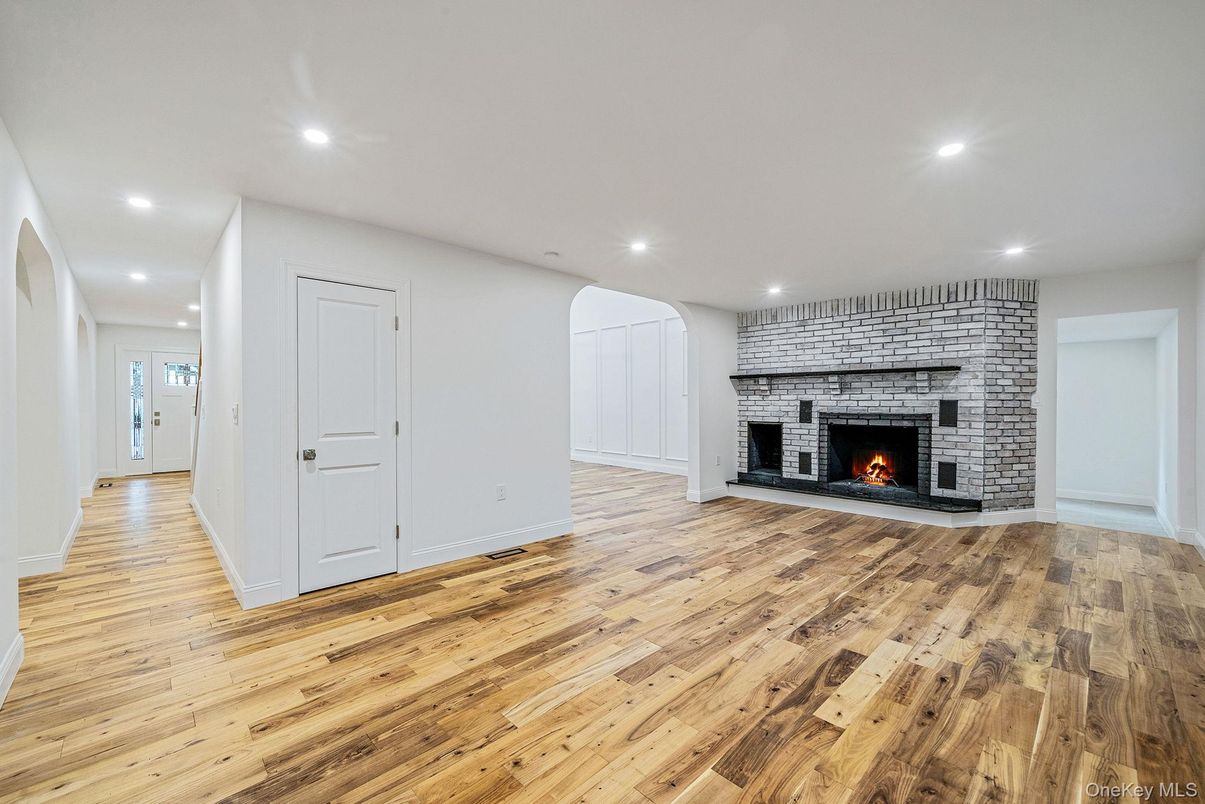 Empty room, Fireplace, Interior, Recessed Lighting, Wood Texture Flooring