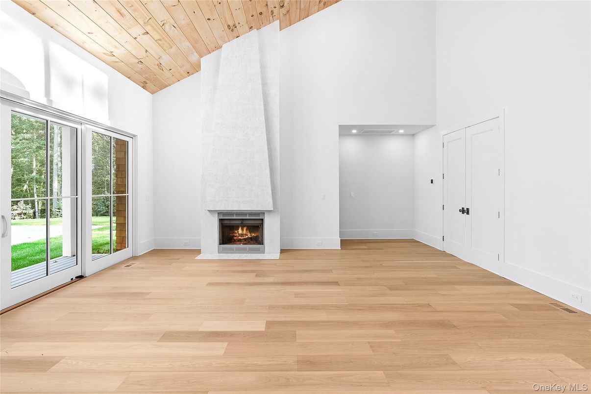 Empty room, Fireplace, Interior, Recessed Lighting, Wooden Ceilings, Wood Texture Flooring