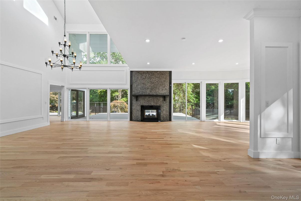 Empty room, Fireplace, Interior, Pendant Lights, Recessed Lighting, Wood Texture Flooring