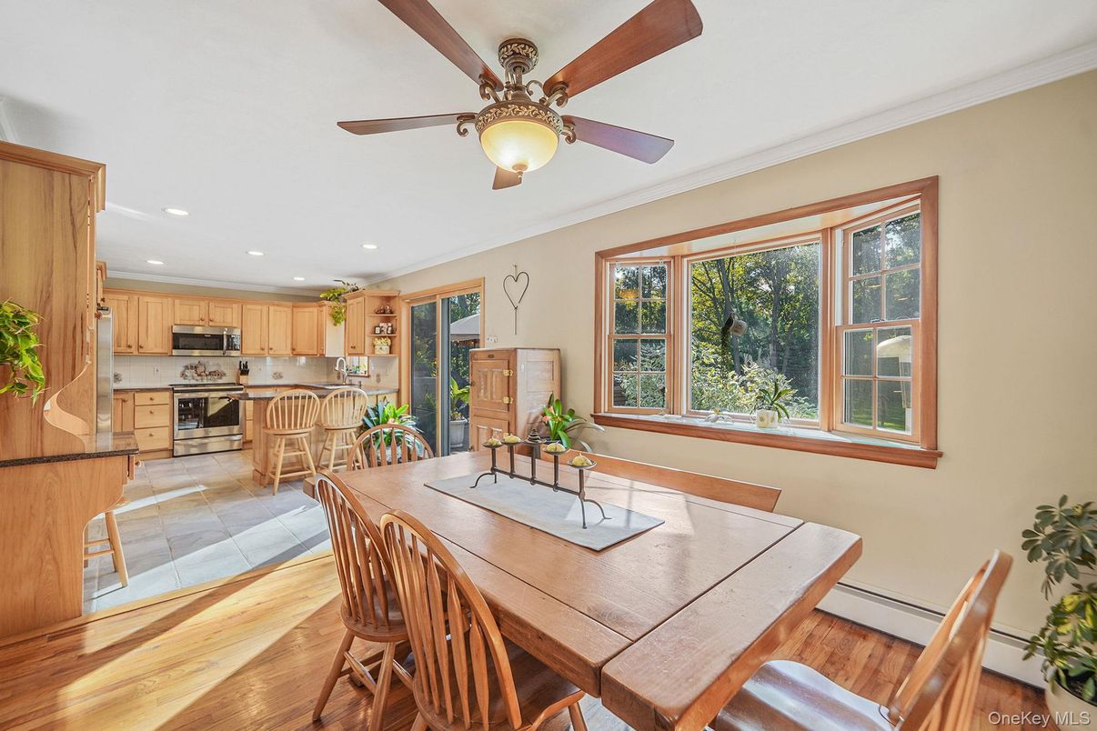 Dining room, Interior, Kitchen, Recessed Lighting, Stainless Steel Appliances, Wood Texture Flooring