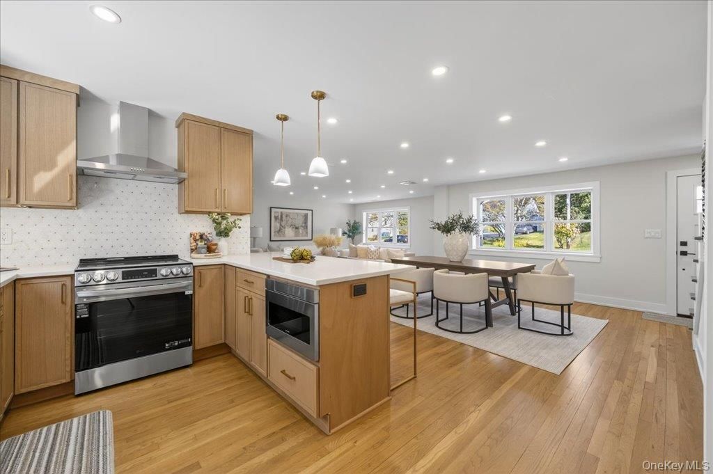 Dining room, Interior, Kitchen, Pendant Lights, Recessed Lighting, Stainless Steel Appliances, Wood Texture Flooring