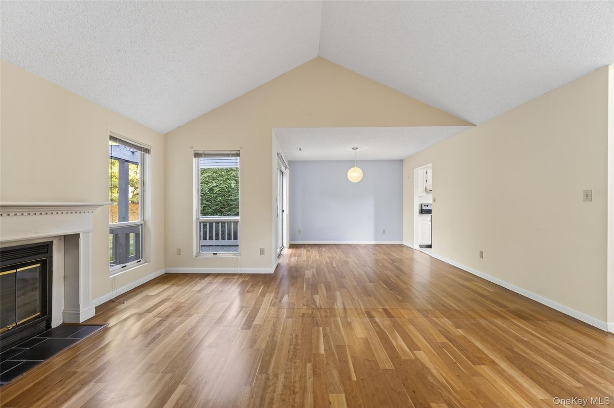 Empty room, Fireplace, Interior, Pendant Lights, Wood Texture Flooring