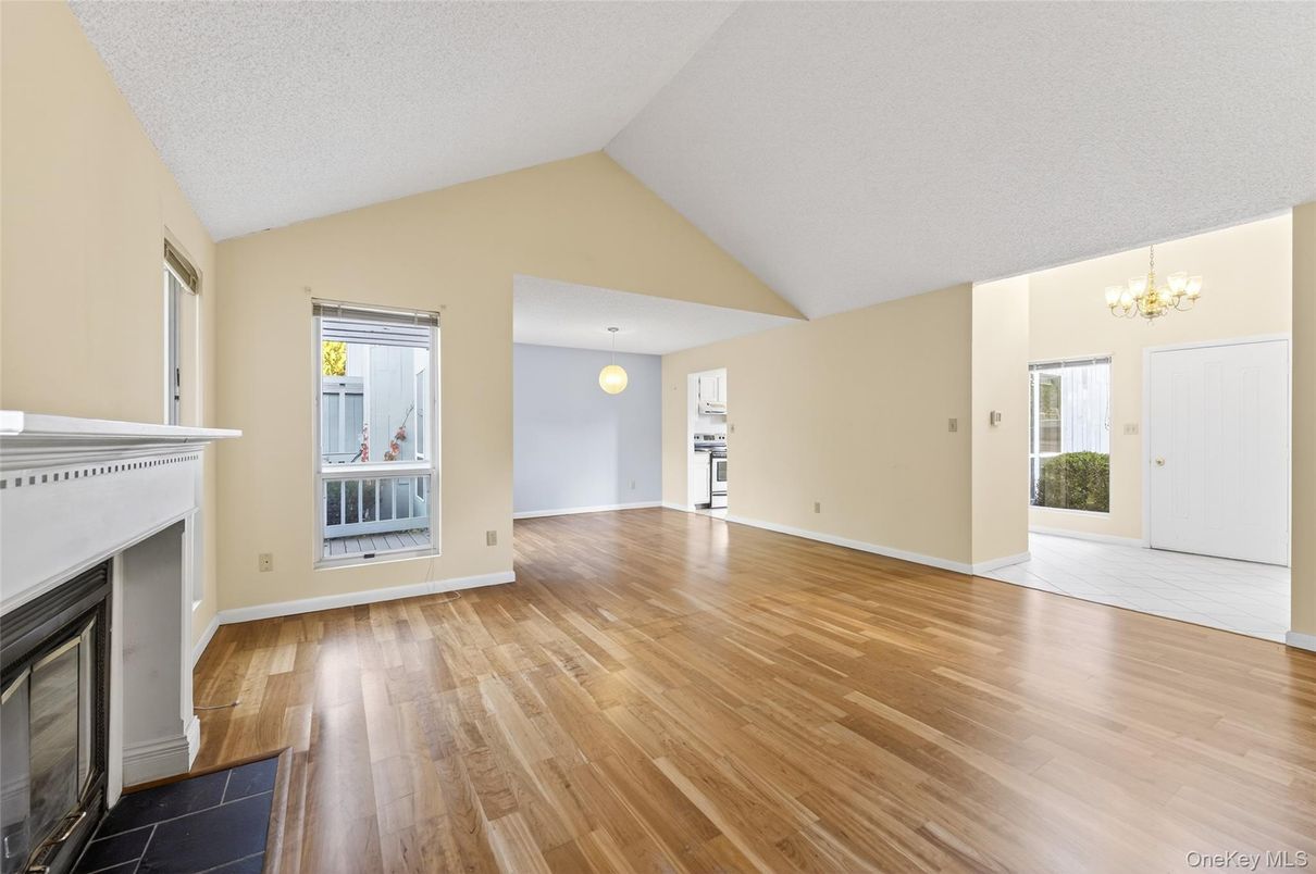 Chandelier, Empty room, Fireplace, Interior, Pendant Lights, Wood Texture Flooring