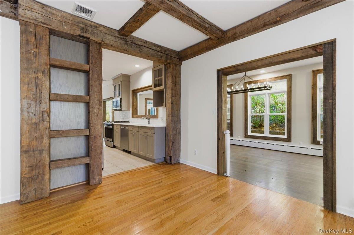 Chandelier, Empty room, Interior, Kitchen, Recessed Lighting, Wooden Beams, Wood Texture Flooring