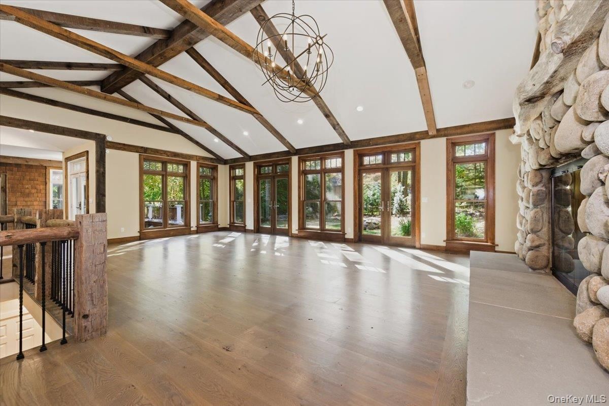 Chandelier, Empty room, Interior, Recessed Lighting, Wooden Beams, Wood Texture Flooring