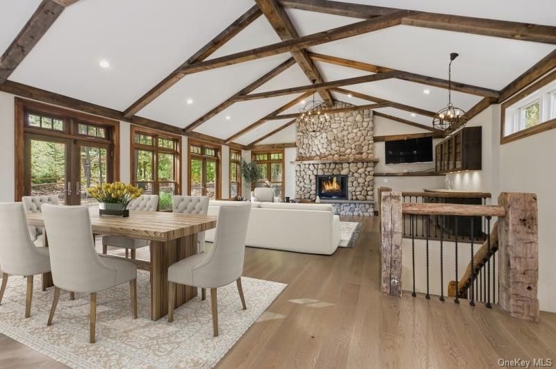 Dining room, Fireplace, Interior, Living room, Pendant Lights, Recessed Lighting, Wooden Beams, Wood Texture Flooring