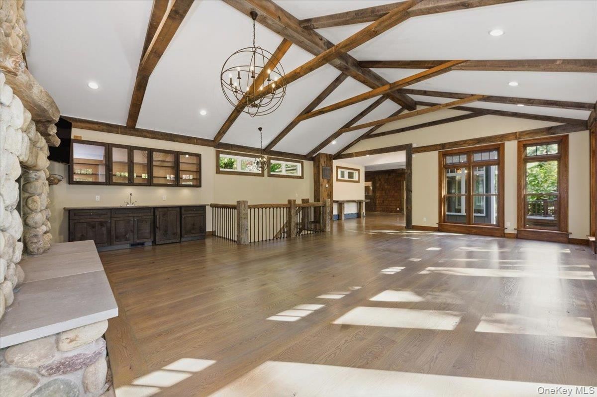 Chandelier, Empty room, Interior, Recessed Lighting, Wooden Beams, Wood Texture Flooring