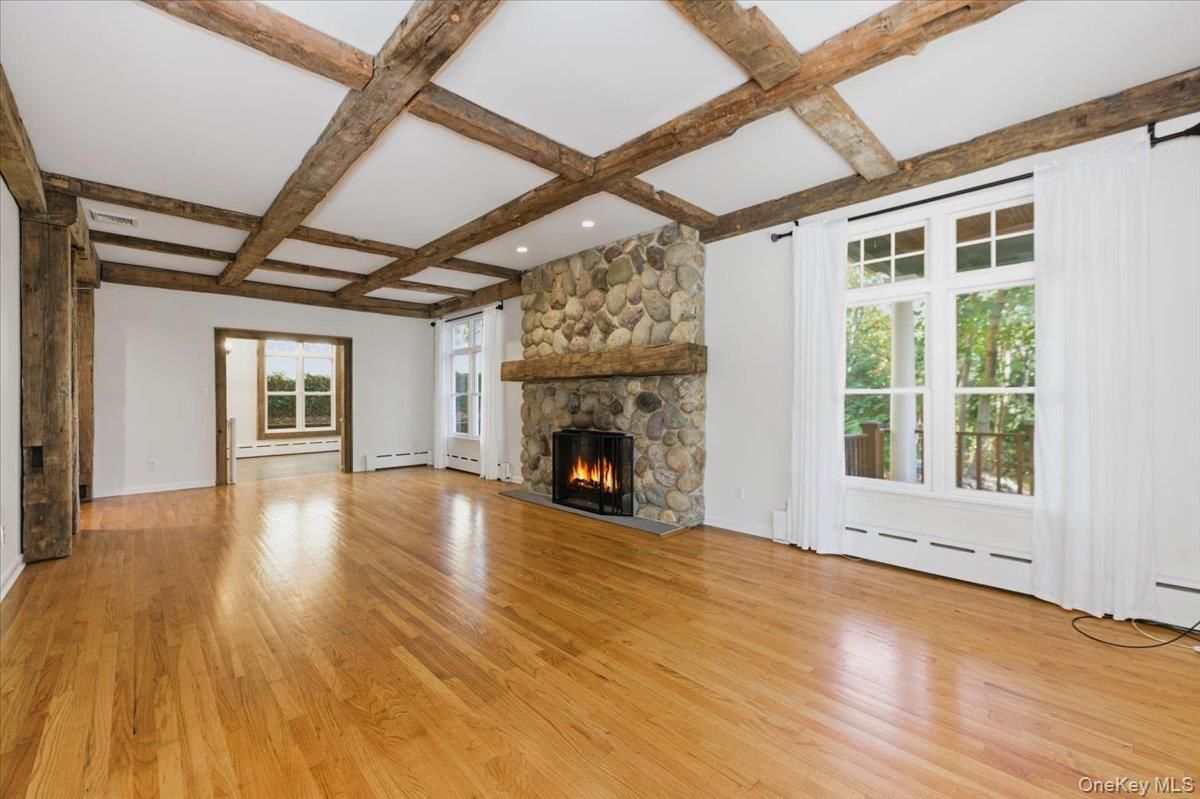 Empty room, Fireplace, Interior, Recessed Lighting, Wooden Beams, Wood Texture Flooring