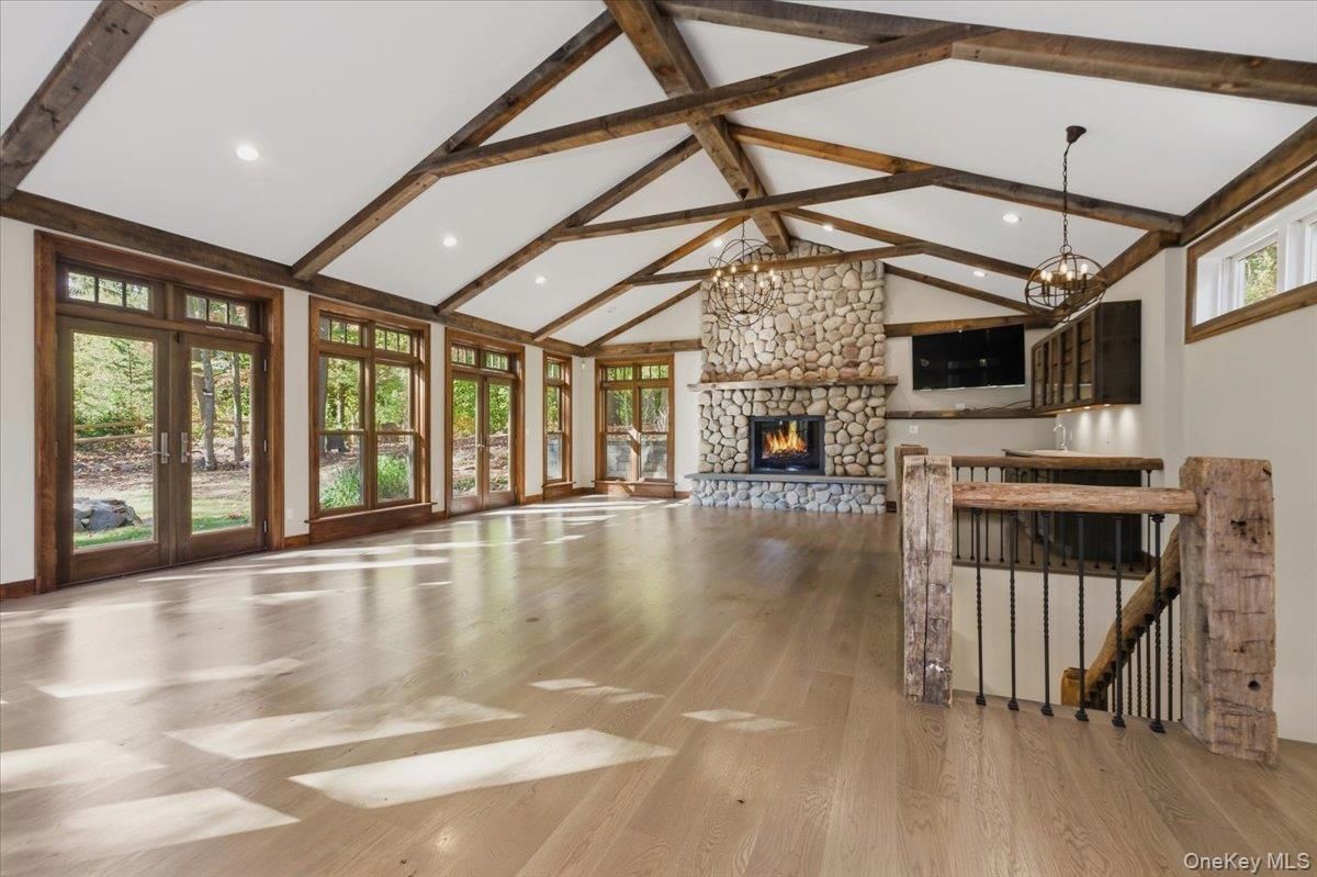 Empty room, Fireplace, Interior, Pendant Lights, Recessed Lighting, Wooden Beams, Wood Texture Flooring