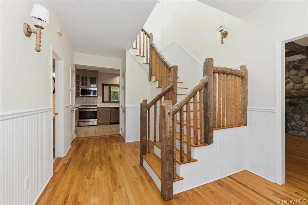 Fireplace, Interior, Kitchen, Stainless Steel Appliances, Wood Texture Flooring