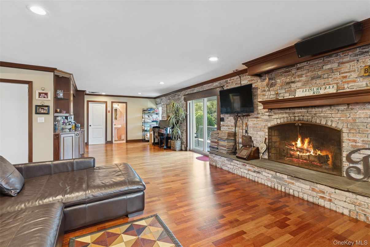 Fireplace, Interior, Recessed Lighting, Stone Walls, Wood Texture Flooring