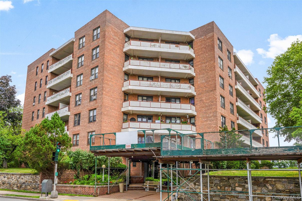 Exterior, Facade, Brick Facade, Condo Building