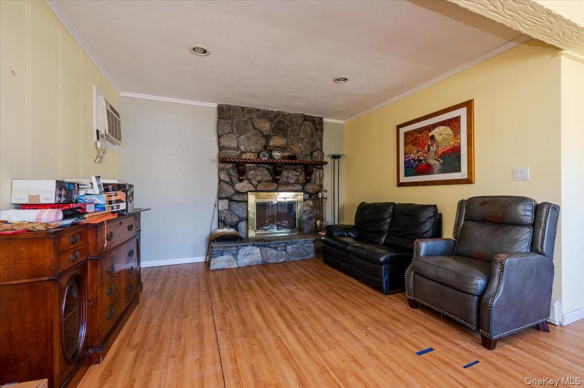 Fireplace, Interior, Recessed Lighting, Stone Walls, Wood Texture Flooring