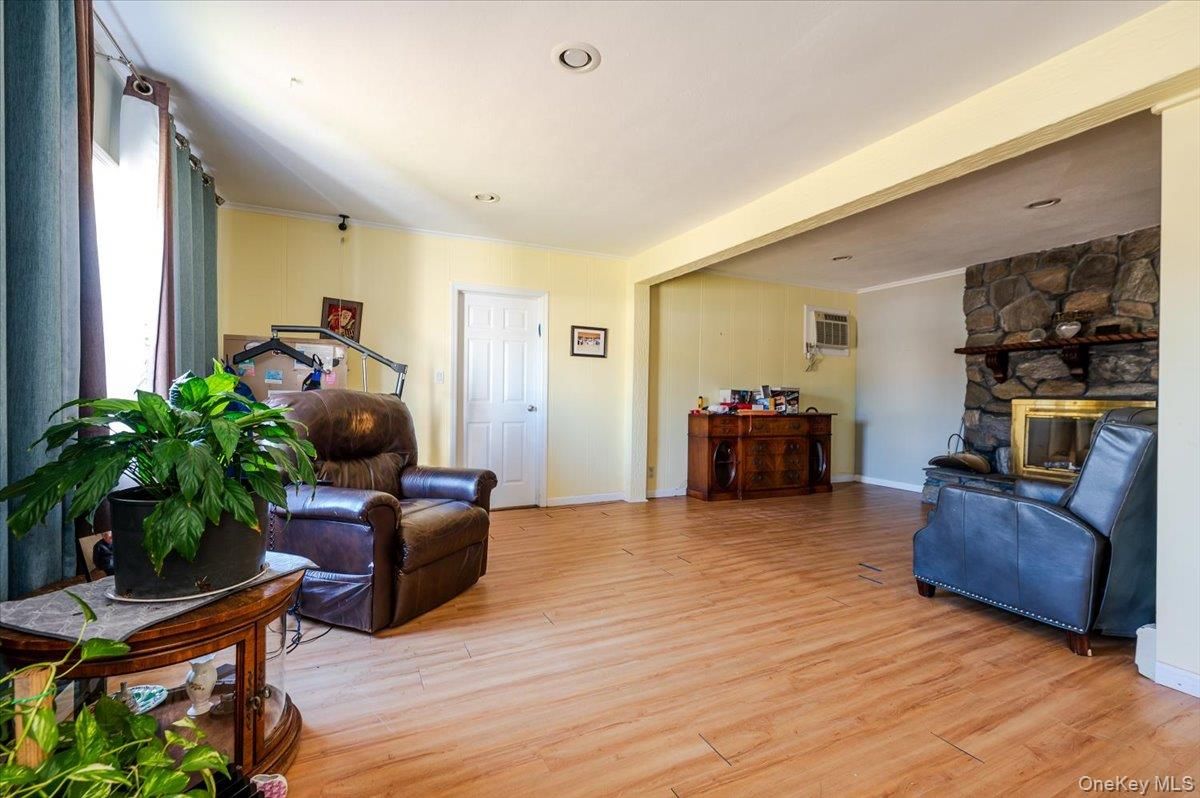 Fireplace, Interior, Recessed Lighting, Stone Walls, Wood Texture Flooring