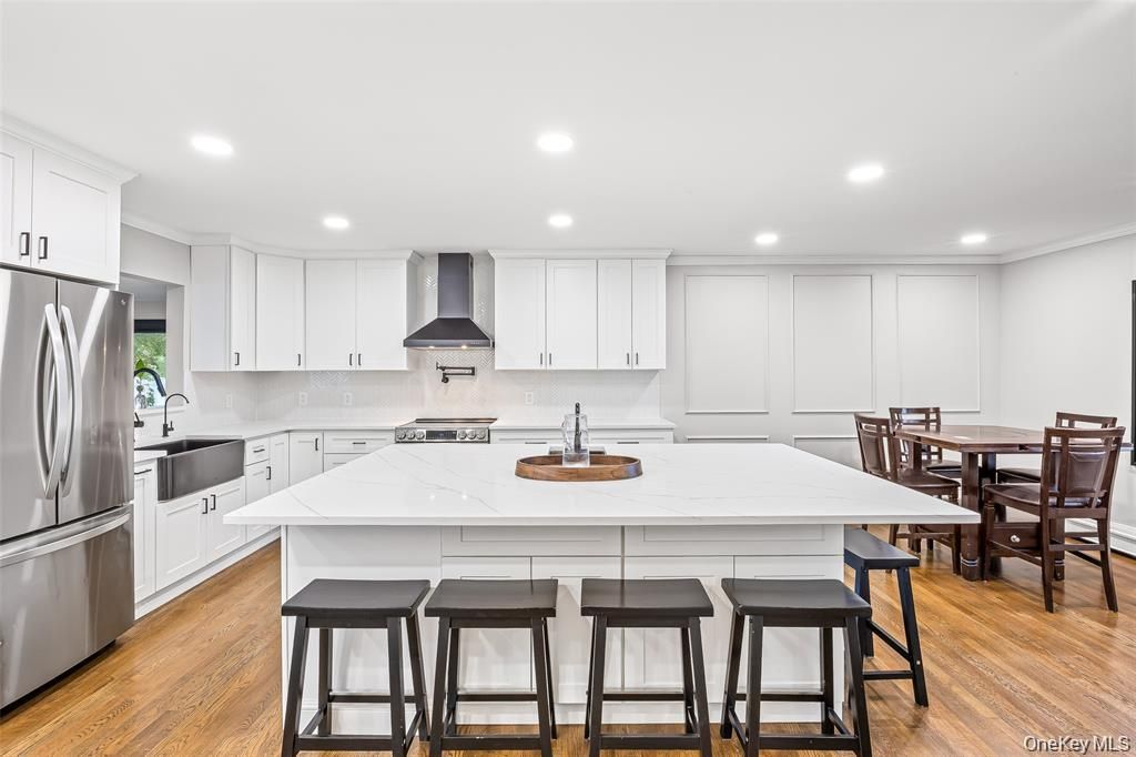 Dining room, Interior, Kitchen, Recessed Lighting, Stainless Steel Appliances, Wood Texture Flooring