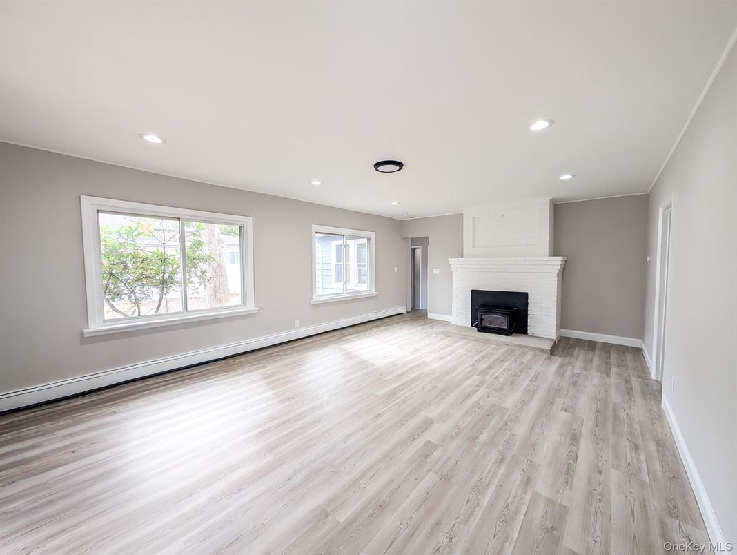 Empty room, Fireplace, Interior, Recessed Lighting, Wood Texture Flooring