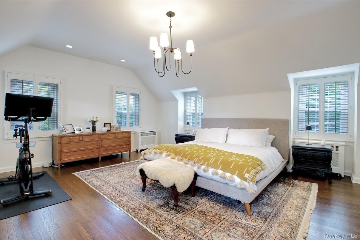 Bedroom, Chandelier, Fitness Equipment, Interior, Recessed Lighting, Wood Texture Flooring