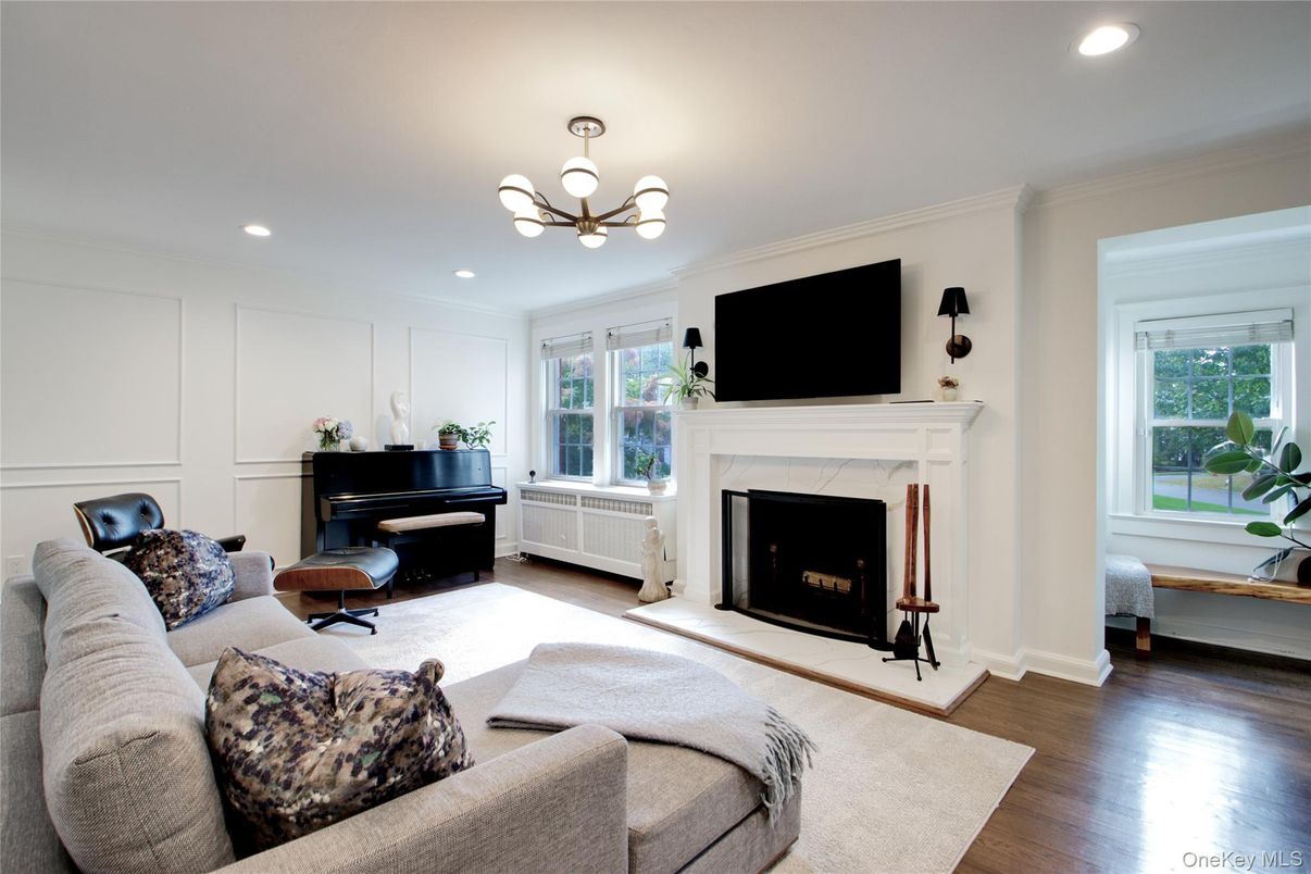 Fireplace, Interior, Living room, Pendant Lights, Piano, Recessed Lighting, Wood Texture Flooring