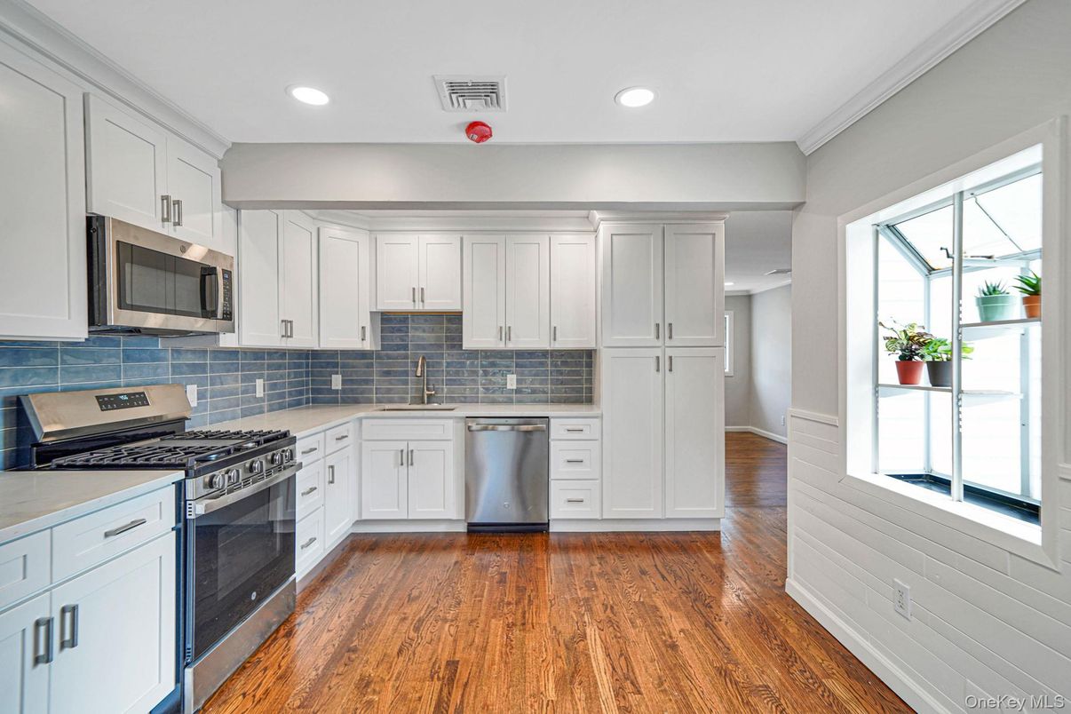 Interior, Kitchen, Recessed Lighting, Stainless Steel Appliances, Wood Texture Flooring