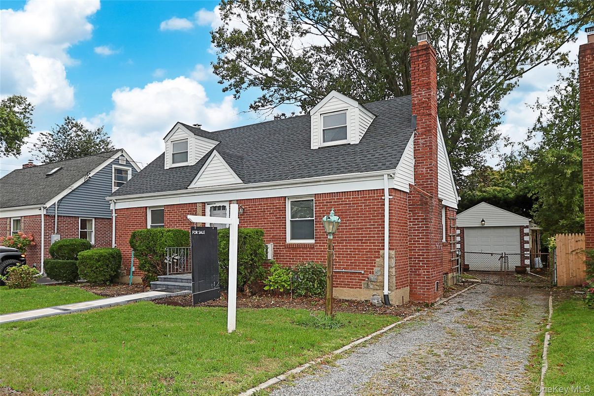 Exterior, Facade, Brick Facade, Cape Cod