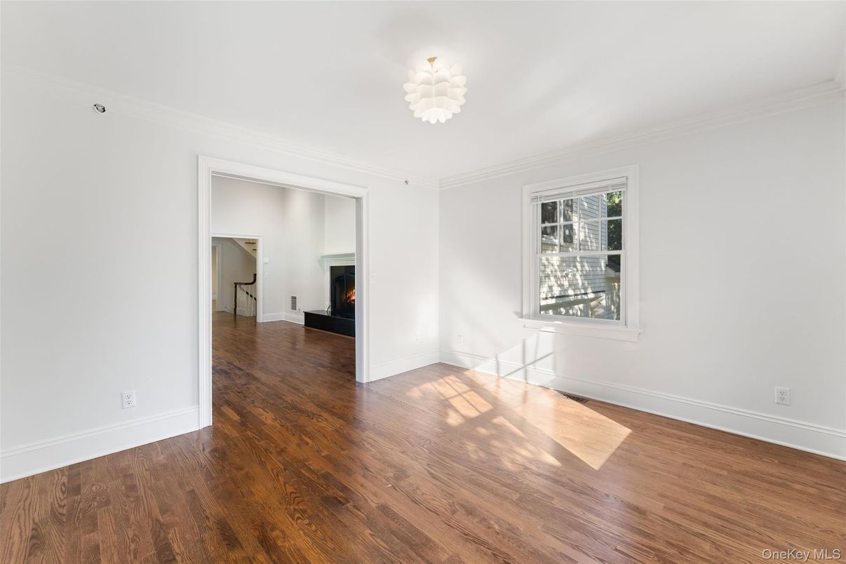 Chandelier, Empty room, Fireplace, Interior, Wood Texture Flooring