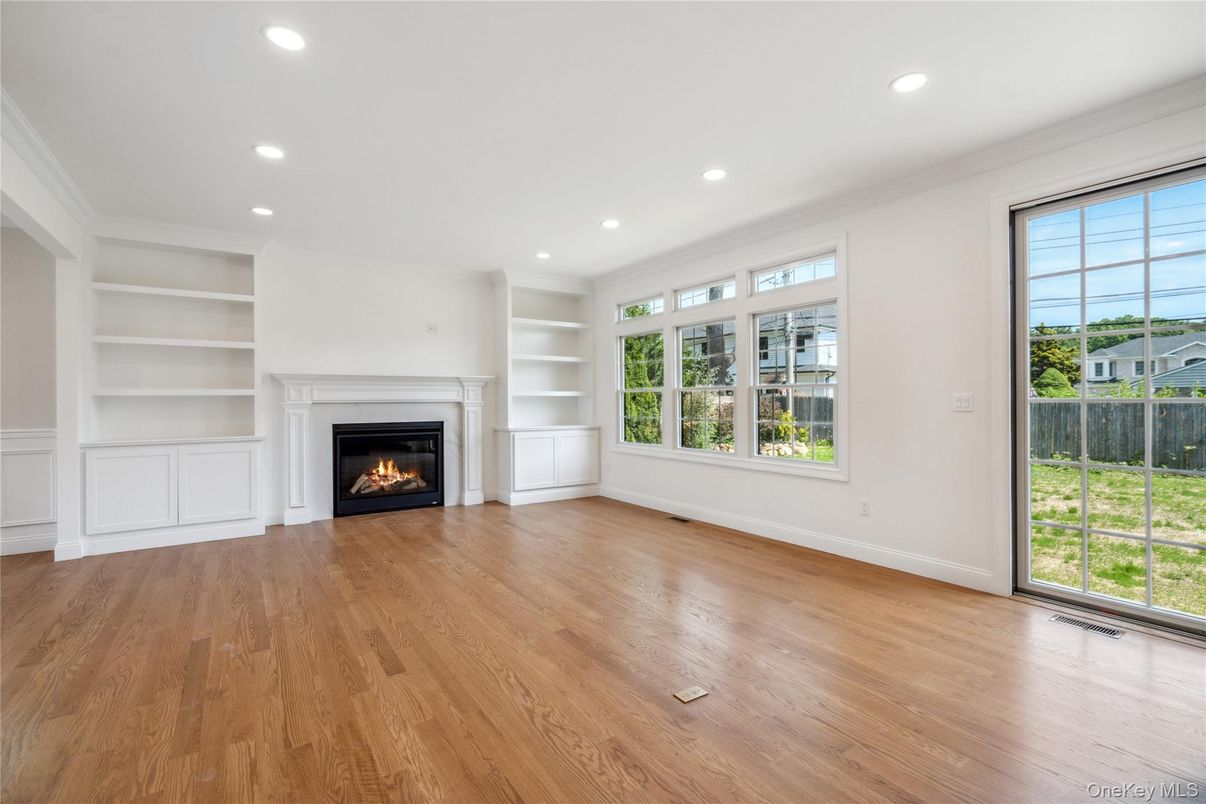 Empty room, Fireplace, Interior, Recessed Lighting, Wood Texture Flooring