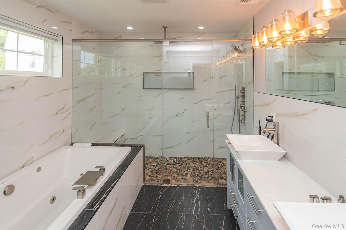 Bathroom, Dual Sink Vanities, Glass Shower, Interior, Marble Walls, Recessed Lighting