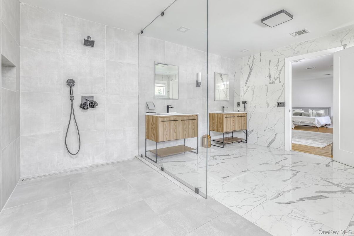 Bathroom, Dual Sink Vanities, Glass Shower, Interior, Marble, Marble Walls