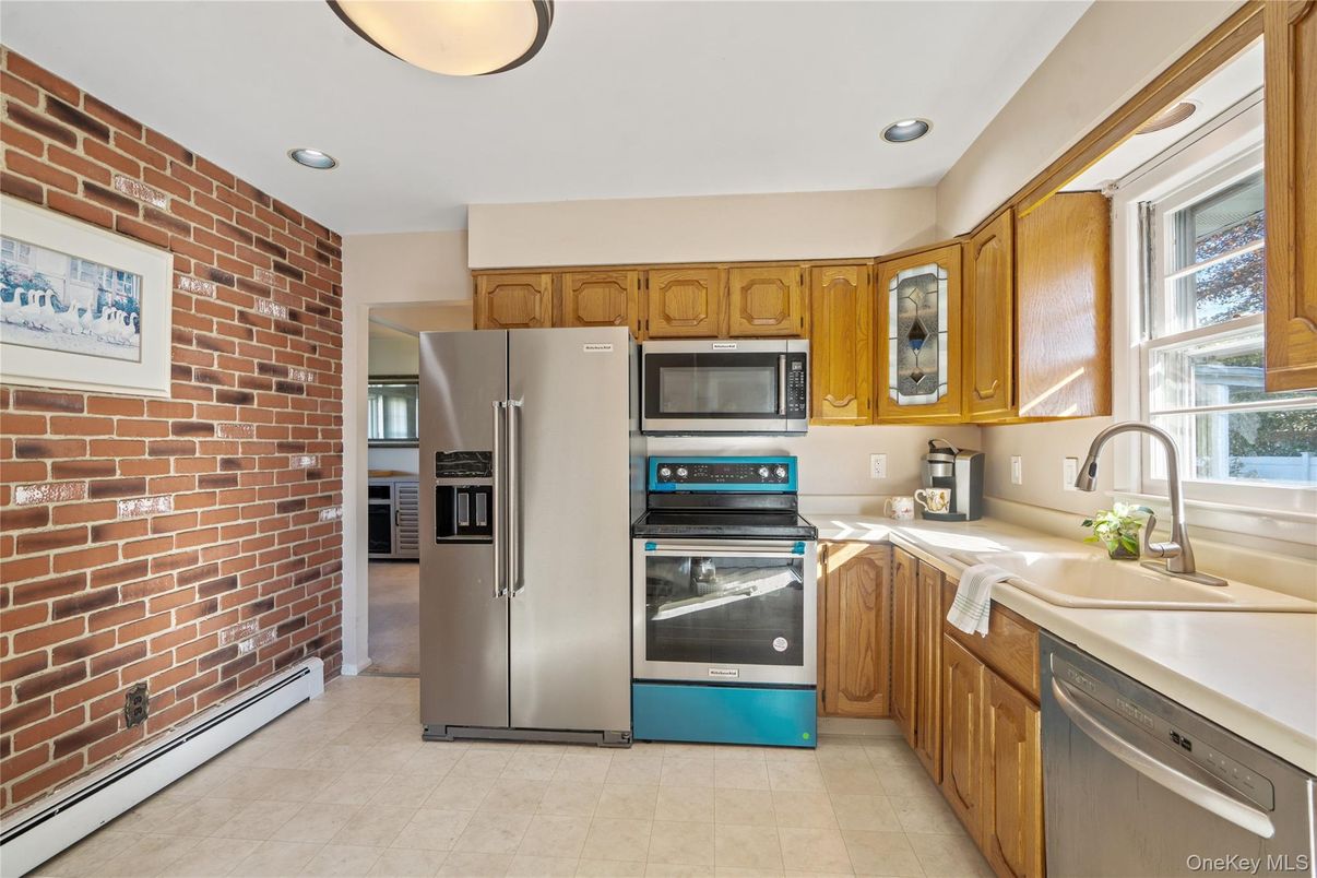 Interior, Kitchen, Recessed Lighting, Stainless Steel Appliances, Stone Walls