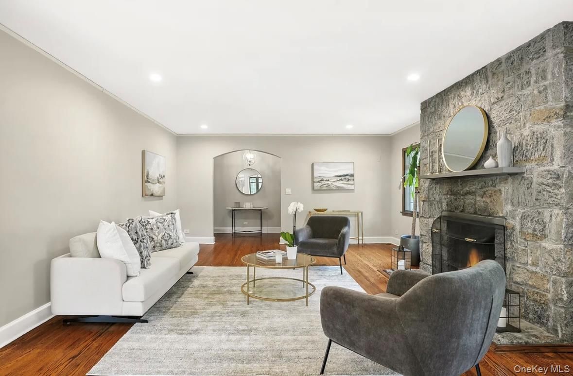 Fireplace, Interior, Living room, Recessed Lighting, Stone Walls, Wood Texture Flooring