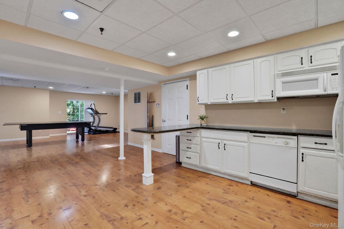 Billiard Table, Fitness Equipment, Game Room, Interior, Kitchen, Recessed Lighting, Wood Texture Flooring