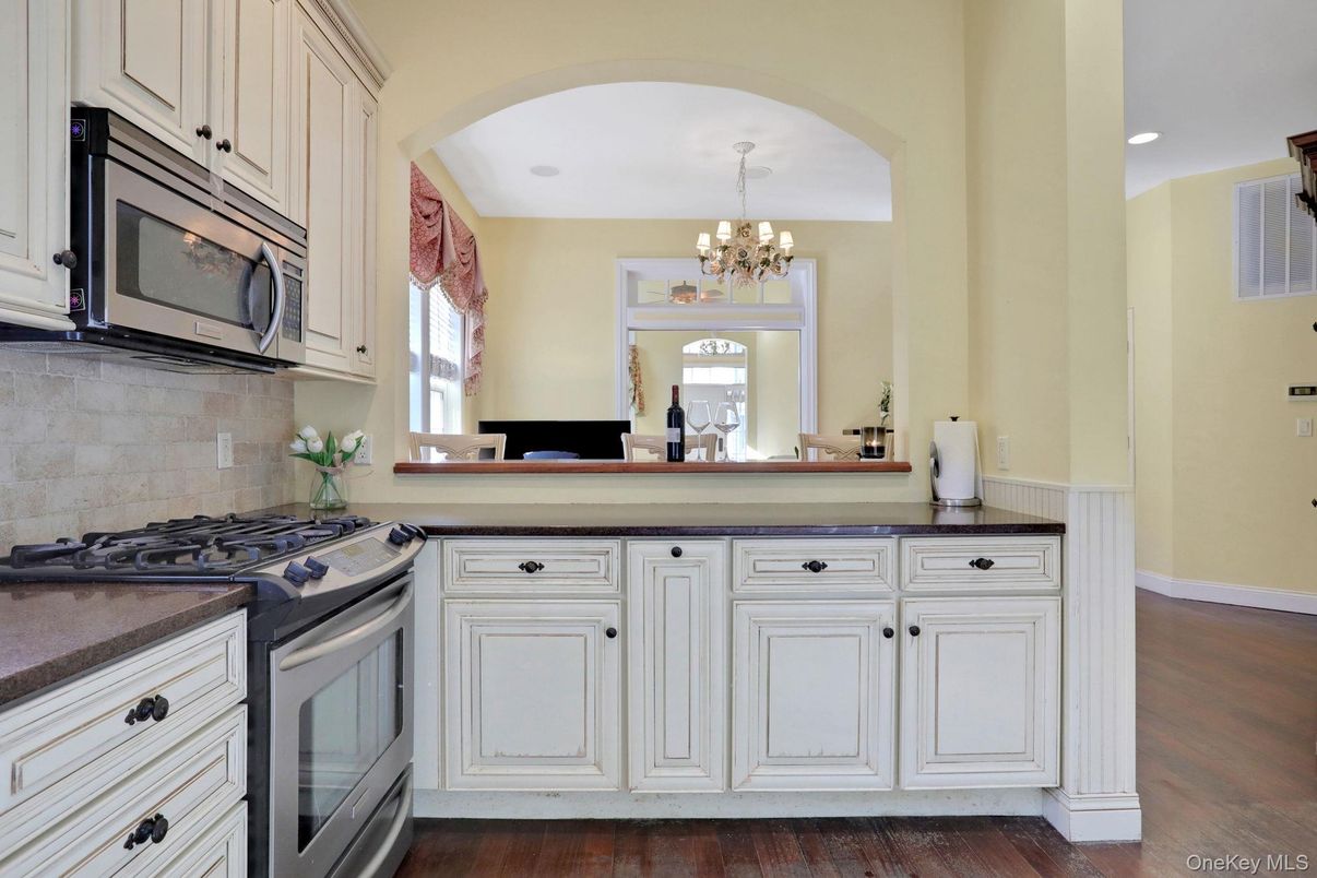 Chandelier, Interior, Kitchen, Recessed Lighting, Stainless Steel Appliances, Wood Texture Flooring