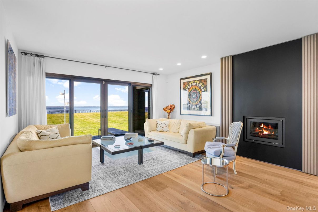 Fireplace, Interior, Living room, Recessed Lighting, Water, Wood Texture Flooring