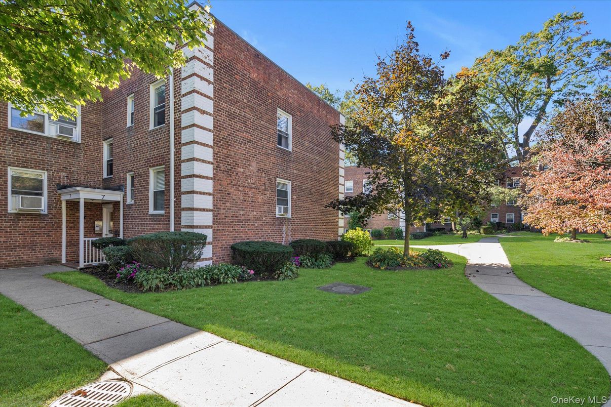 Exterior, Facade, Brick Facade, Condo Building