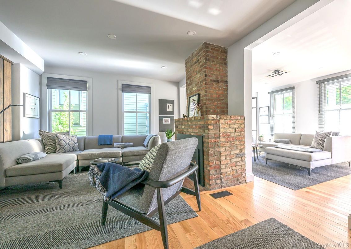 Fireplace, Interior, Living room, Recessed Lighting, Stone Walls, Wood Texture Flooring