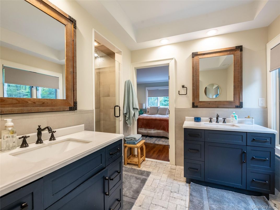 Bathroom, Bedroom, Dual Sink Vanities, Glass Shower, Interior, Recessed Lighting, Wood Texture Flooring