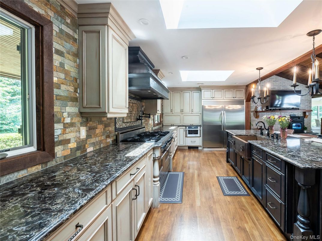Interior, Kitchen, Pendant Lights, Recessed Lighting, Stainless Steel Appliances, Stone Walls, Wood Texture Flooring
