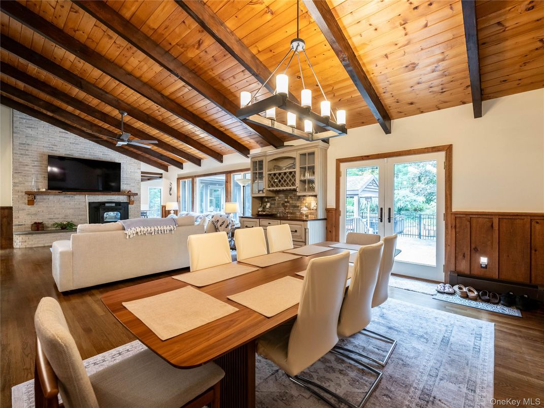 Dining room, Fireplace, Interior, Living room, Pendant Lights, Stone Walls, Wooden Beams, Wooden Ceilings, Wood Texture Flooring