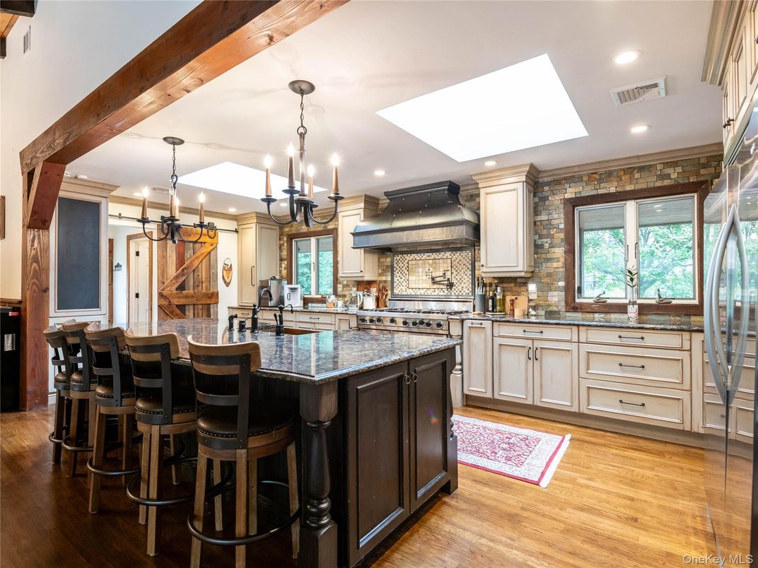 Chandelier, Interior, Kitchen, Pendant Lights, Recessed Lighting, Stainless Steel Appliances, Wooden Beams, Wood Texture Flooring