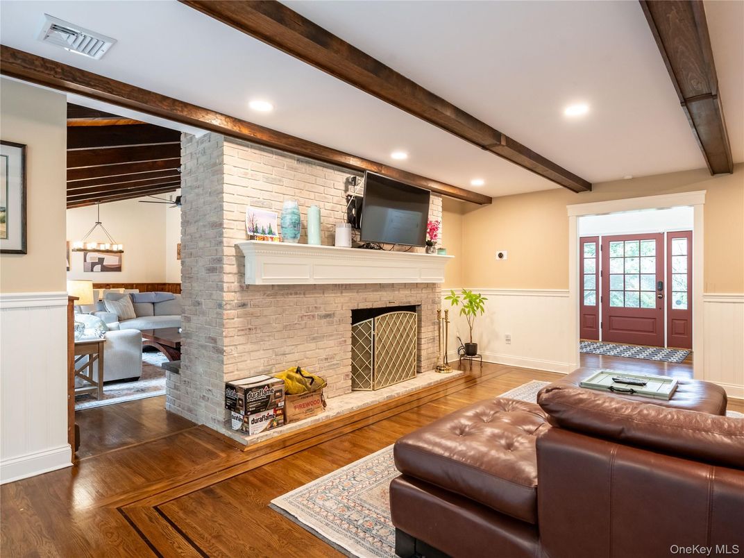 Fireplace, Interior, Living room, Recessed Lighting, Stone Walls, Wooden Beams, Wood Texture Flooring