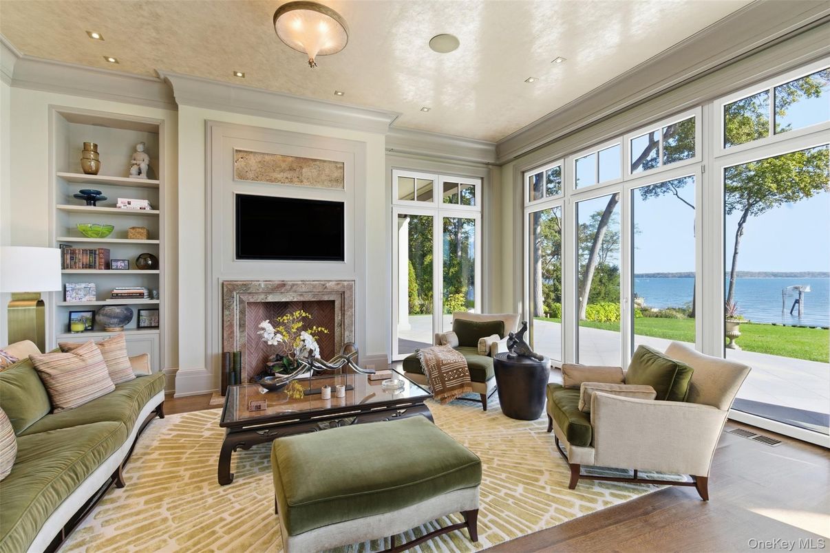 Fireplace, Interior, Living room, Recessed Lighting, Sun Room, Water, Wood Texture Flooring