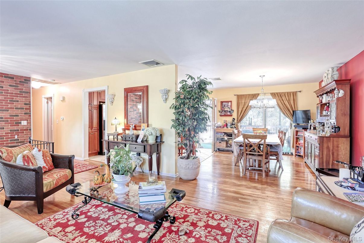 Chandelier, Dining room, Interior, Living room, Stone Walls, Wood Texture Flooring
